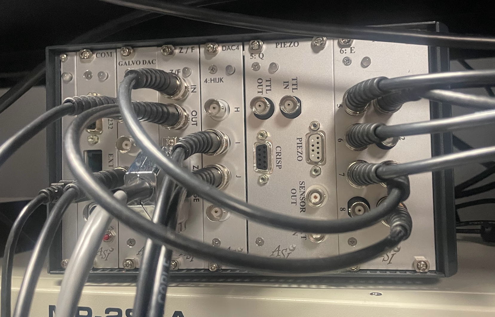 ASI Tiger BNC connections for stage trigger and sync signals.
